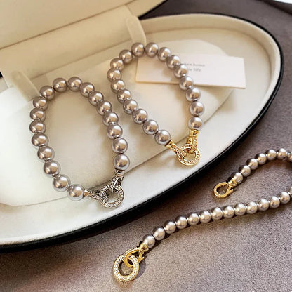 Microconjunto francés elegante con hebilla redonda de circón, pulseras con dijes de perlas de imitación para mujer, conjunto de joyería con carácter, nuevos accesorios