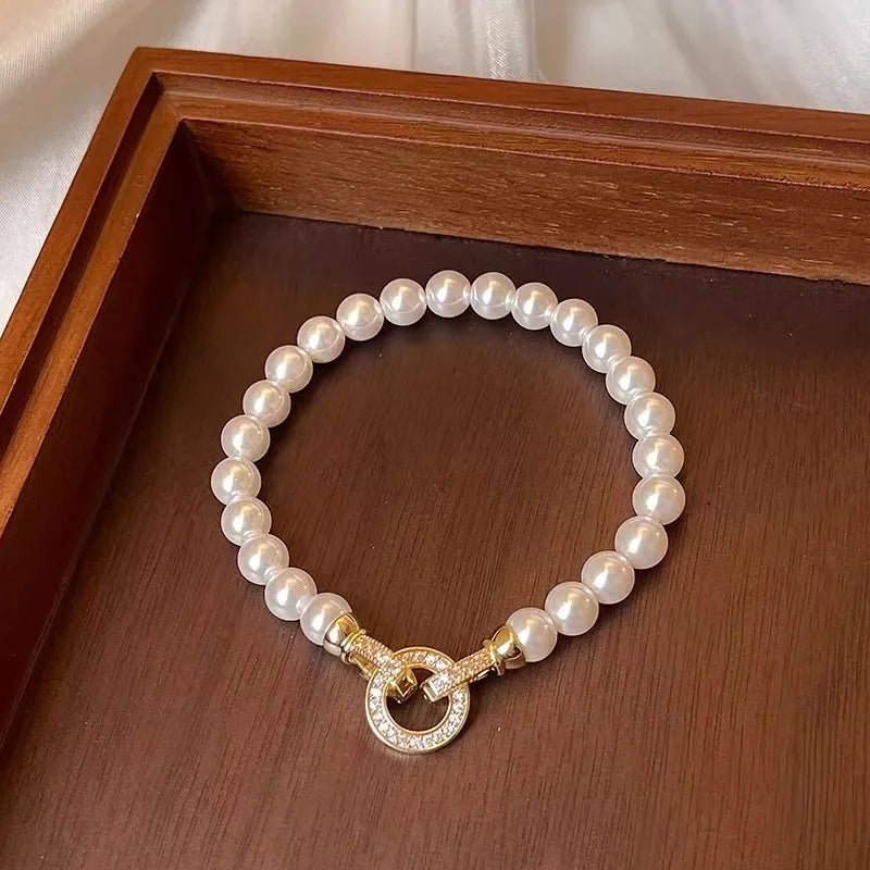 Microconjunto francés elegante con hebilla redonda de circón, pulseras con dijes de perlas de imitación para mujer, conjunto de joyería con carácter, nuevos accesorios